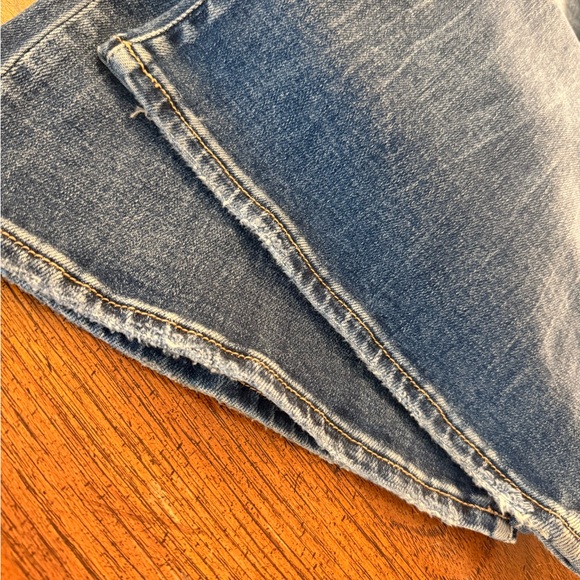 Buckle Distressed Flare Jeans - Picture 9 of 10